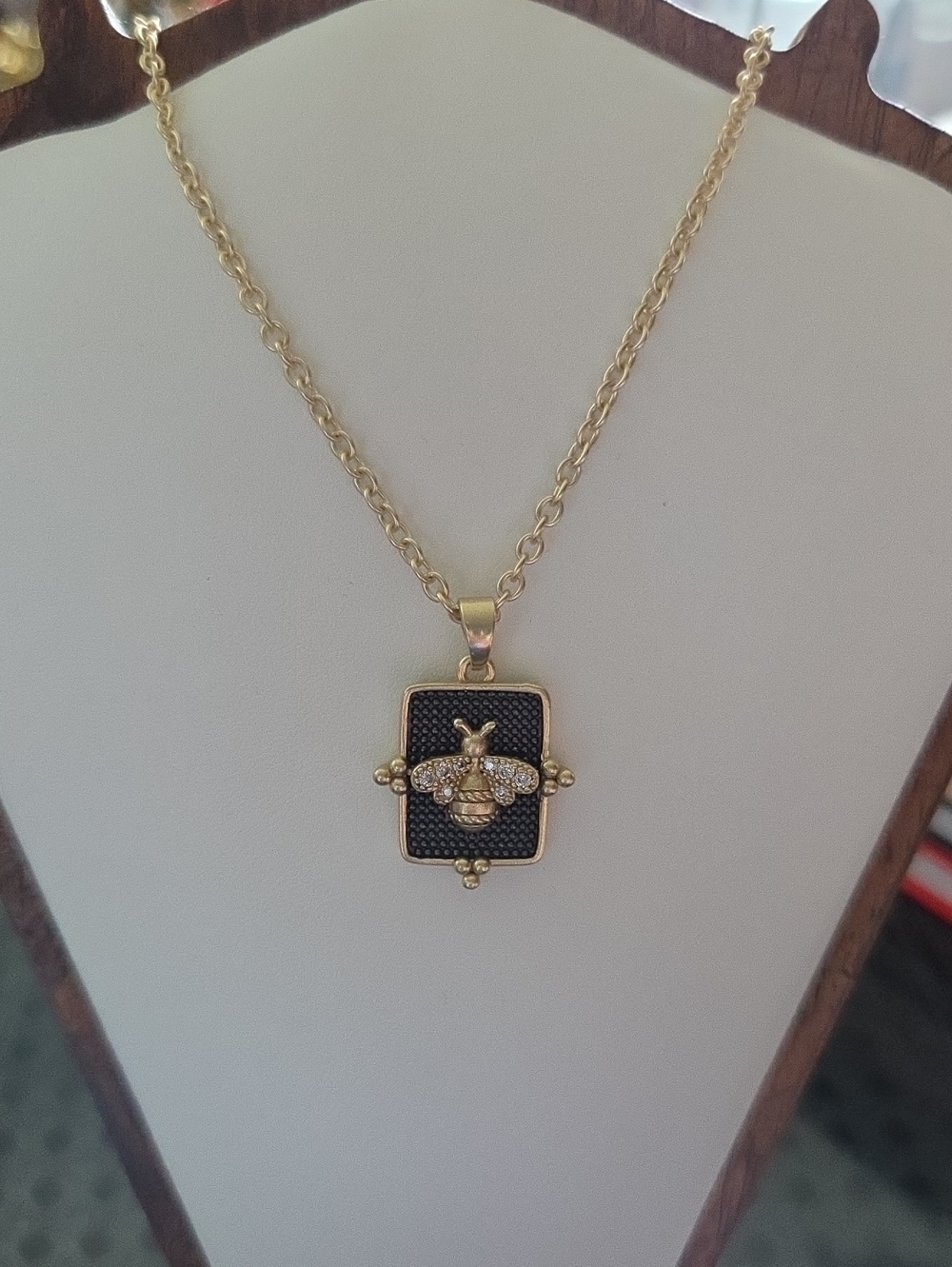 Gold Bee Pendant Necklace with Black Accent